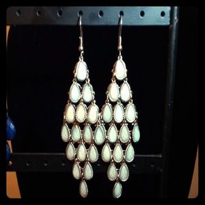 Grey and silver earrings.